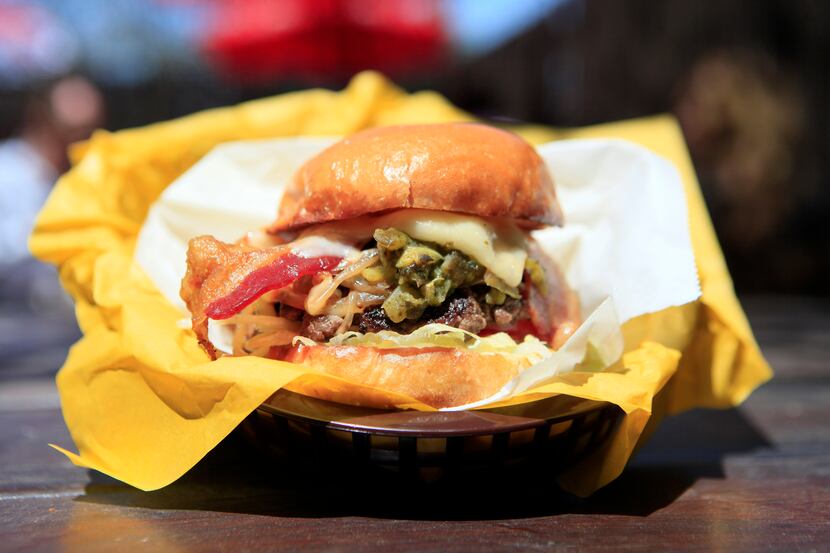 The green chile and bacon cheese burger from Off-Site Kitchen restaurant, on Tuesday April...