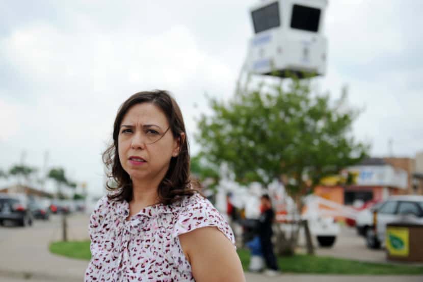 Angelina Avalos, whose Vickery Meadow Improvement District installed five cameras last fall,...