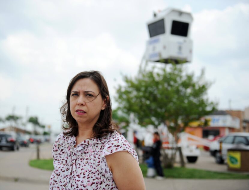 Angelina Avalos, whose Vickery Meadow Improvement District installed five cameras last fall,...