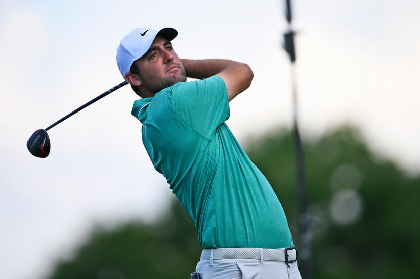 Scottie Scheffler watches his shot on the 17th tee during the second round of the BMW...