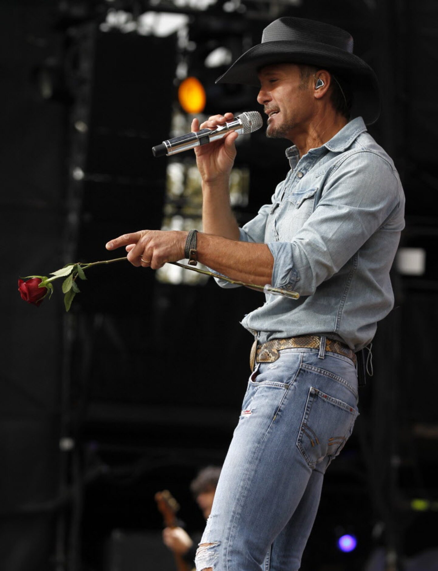 Tim McGraw sings during his performance at the March Madness Music Festival at Reunion Park...