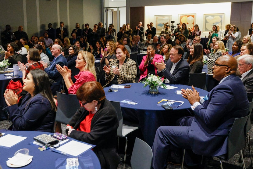 Attendees applaud after the announcement of a $60 million investment from the O’Donnell...