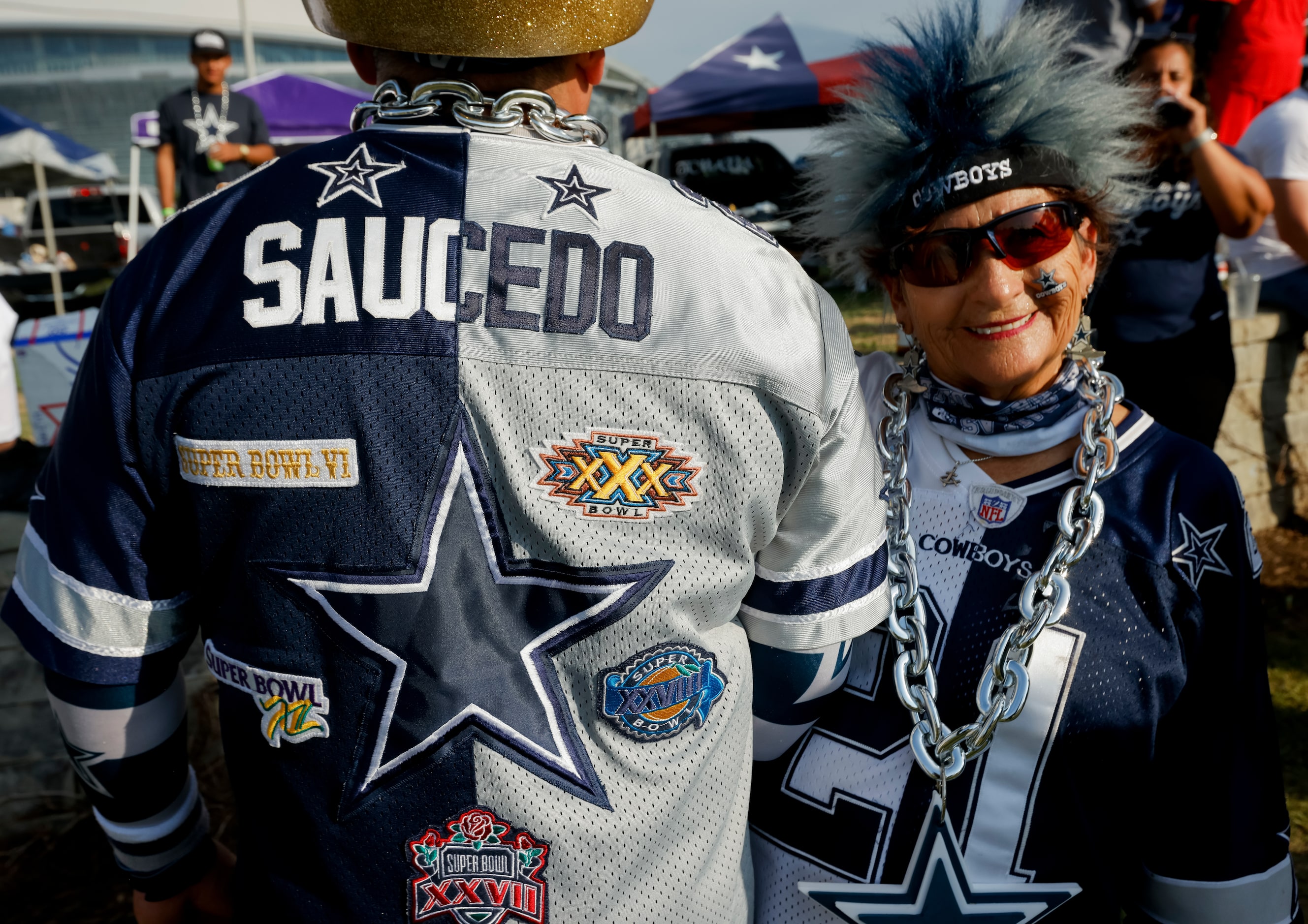 Irma Saucedo (left) of San Antonio poses with son Stephen Saucedo before the start of the...