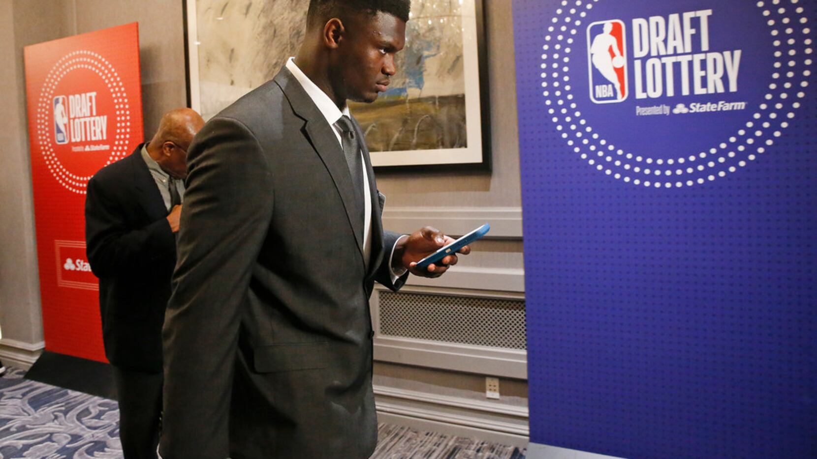 Duke's Zion Williamson arrives for the NBA basketball draft lottery Tuesday, May 14, 2019,...