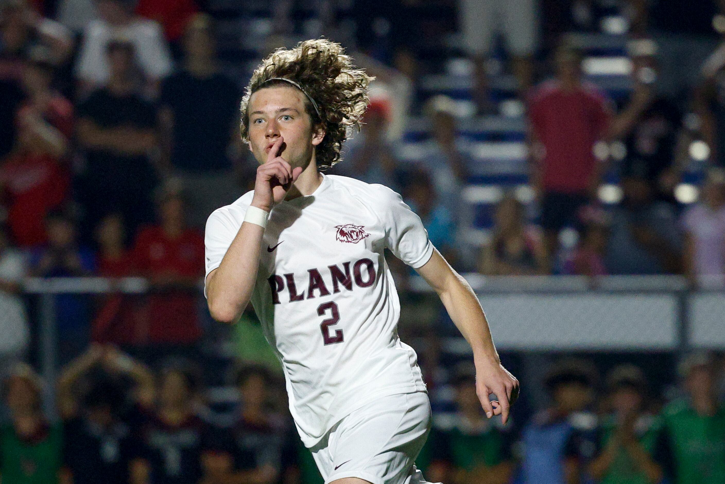 Plano defender Dayton Ralph (2) motions after scoring on a penalty kick during shootout in...