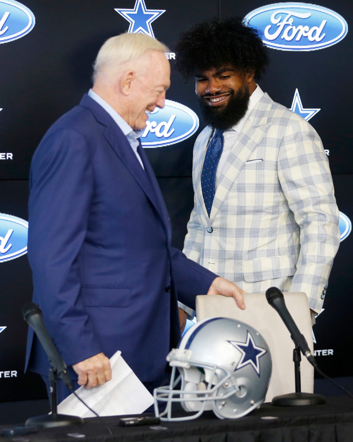 Dallas Cowboys owner and general manager Jerry Jones and Dallas Cowboys running back Ezekiel...