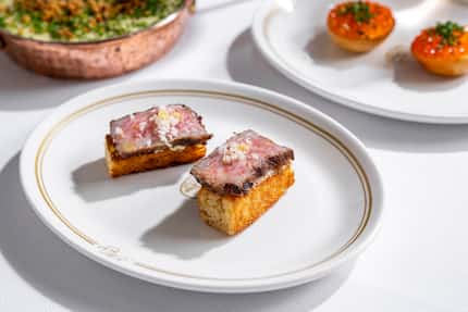 Mister Charles' menu starts with one-bite canapés. Here's the A5 striploin on brioche, $14.