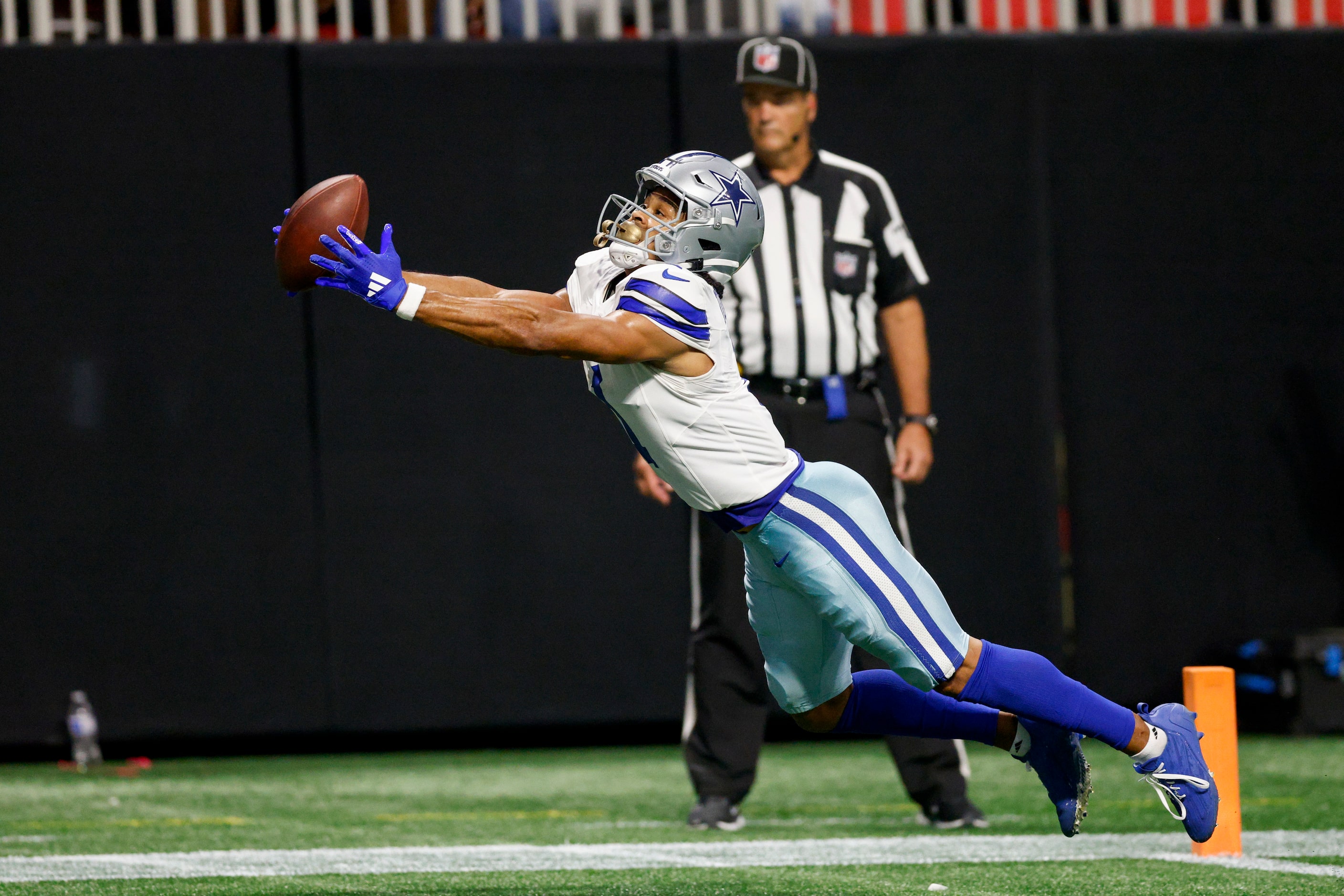 Dallas Cowboys wide receiver Jalen Tolbert (1) fails to haul in a pass as he dives into the...