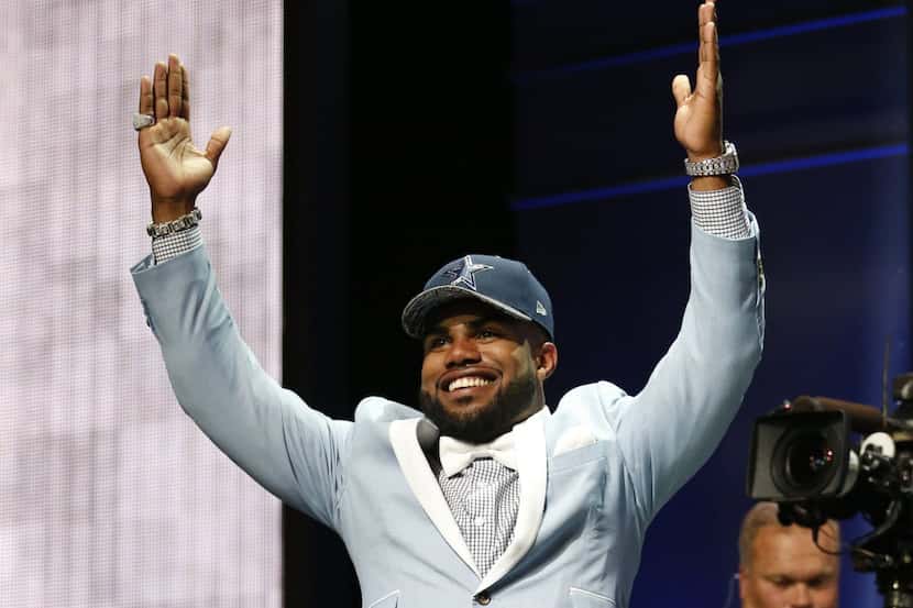 Apr 28, 2016; Chicago, IL, USA; Ezekiel Elliott (Ohio State) after being selected by the...