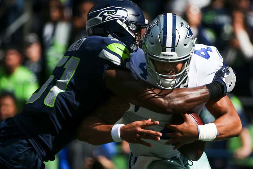 Seattle Seahawks linebacker Barkevious Mingo (51) sacks Dallas Cowboys quarterback Dak...