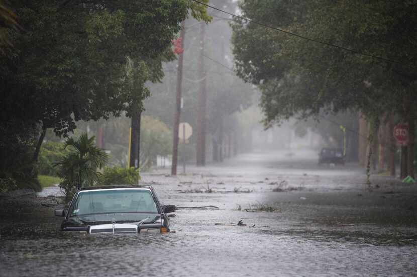 Cars and streets flooded as Hurricane Matthew hit St. Augustine, Fla., on Friday. 