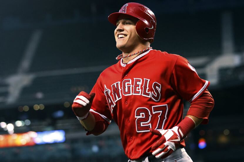 FILE - In this Aug. 31, 2012, file photo, Los Angeles Angels' Mike Trout smiles after...