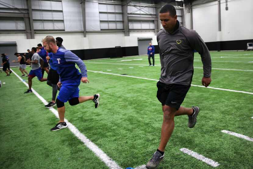 Texas Rangers minor league player Anthony Gose runs sprints during training at Arlington...