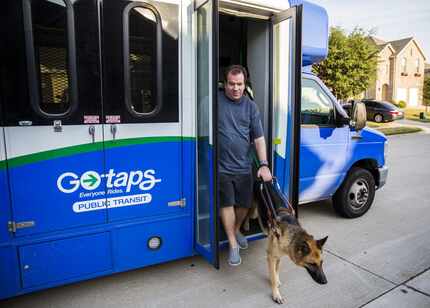 Justin Mann and his guide dog, Garvey, arrived at their McKinney home on a TAPS Public...