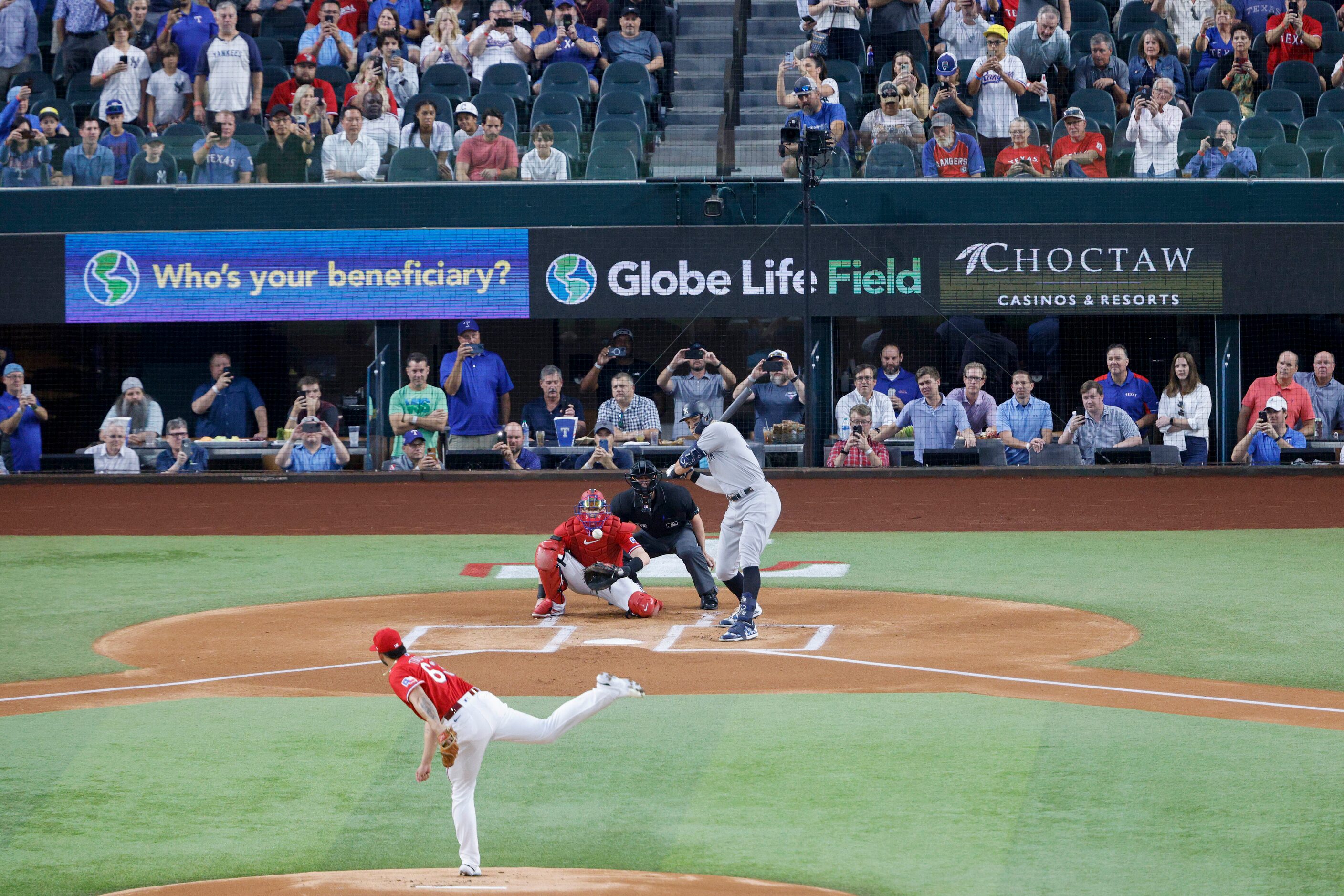 Texas Rangers starting pitcher Jesus Tinoco (63) delivers a pitch to New York Yankees right...