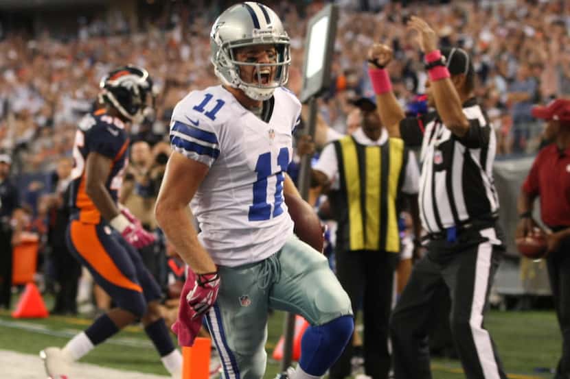Dallas Cowboys wide receiver Cole Beasley (11) celebrates his touchdown during the first...