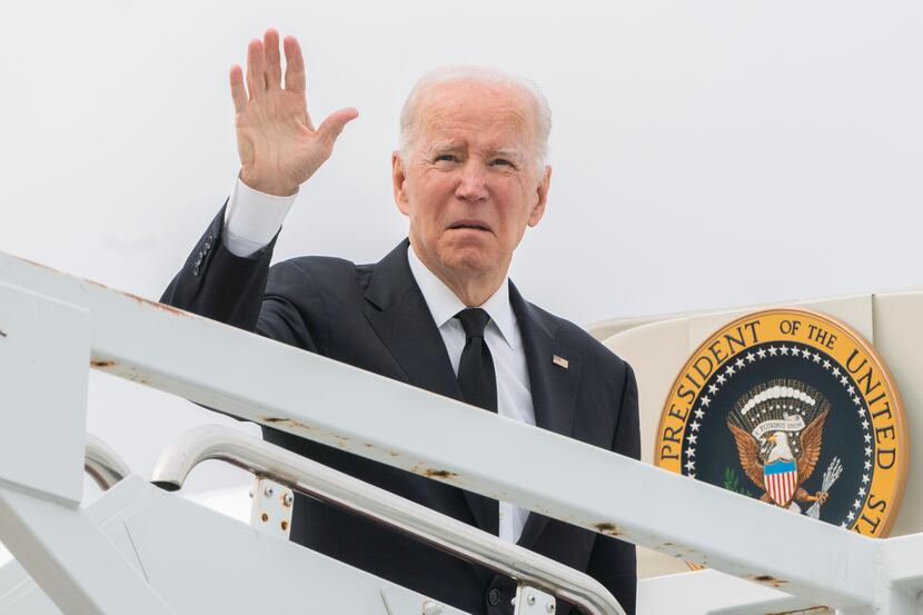 President Joe Biden waves before boarding Air Force One at Delaware Air National Guard Base...