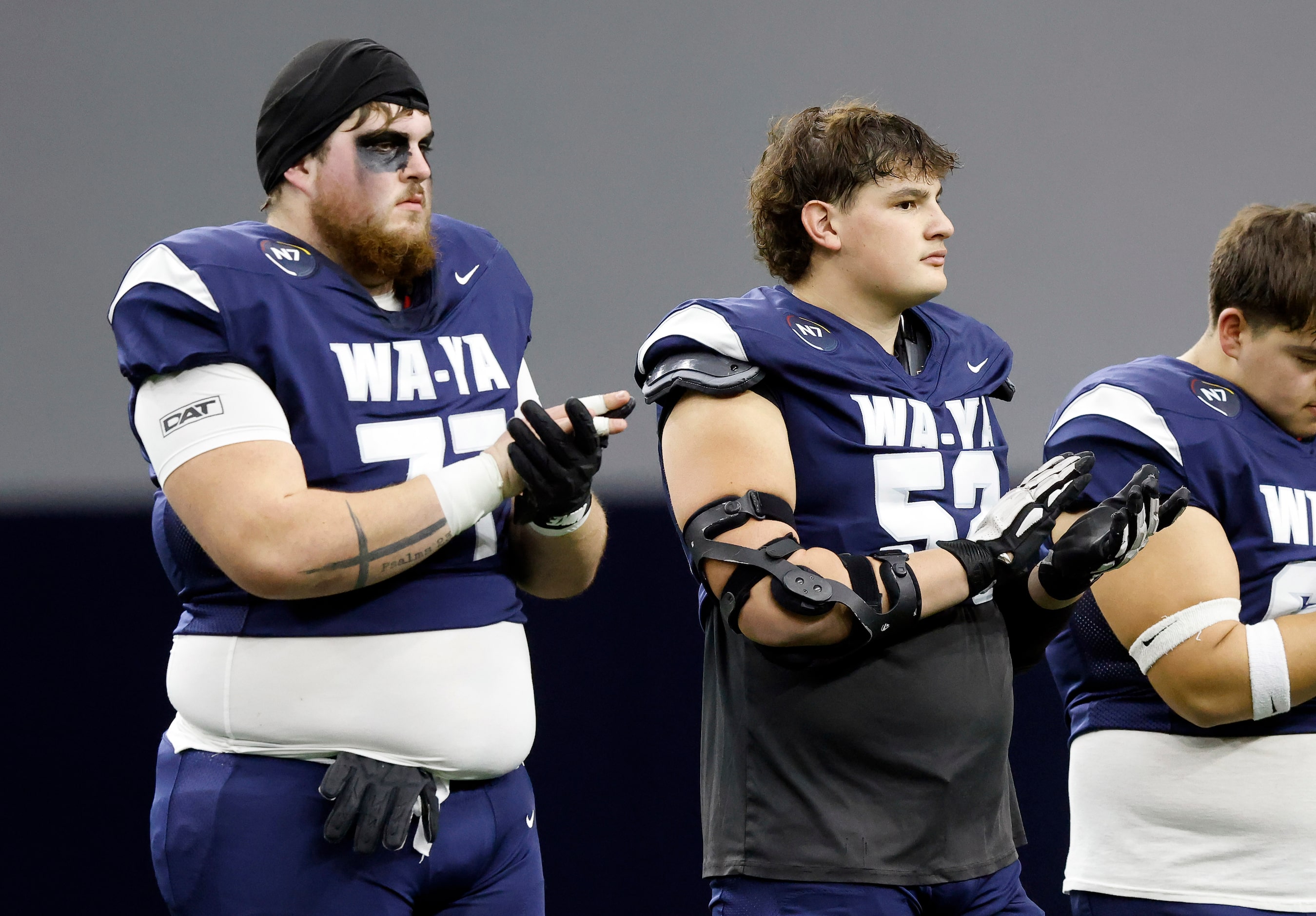 Wa-Ya football players Connor Frazier (left) of Hugo High (OK) and Jose Marquez (52) of...