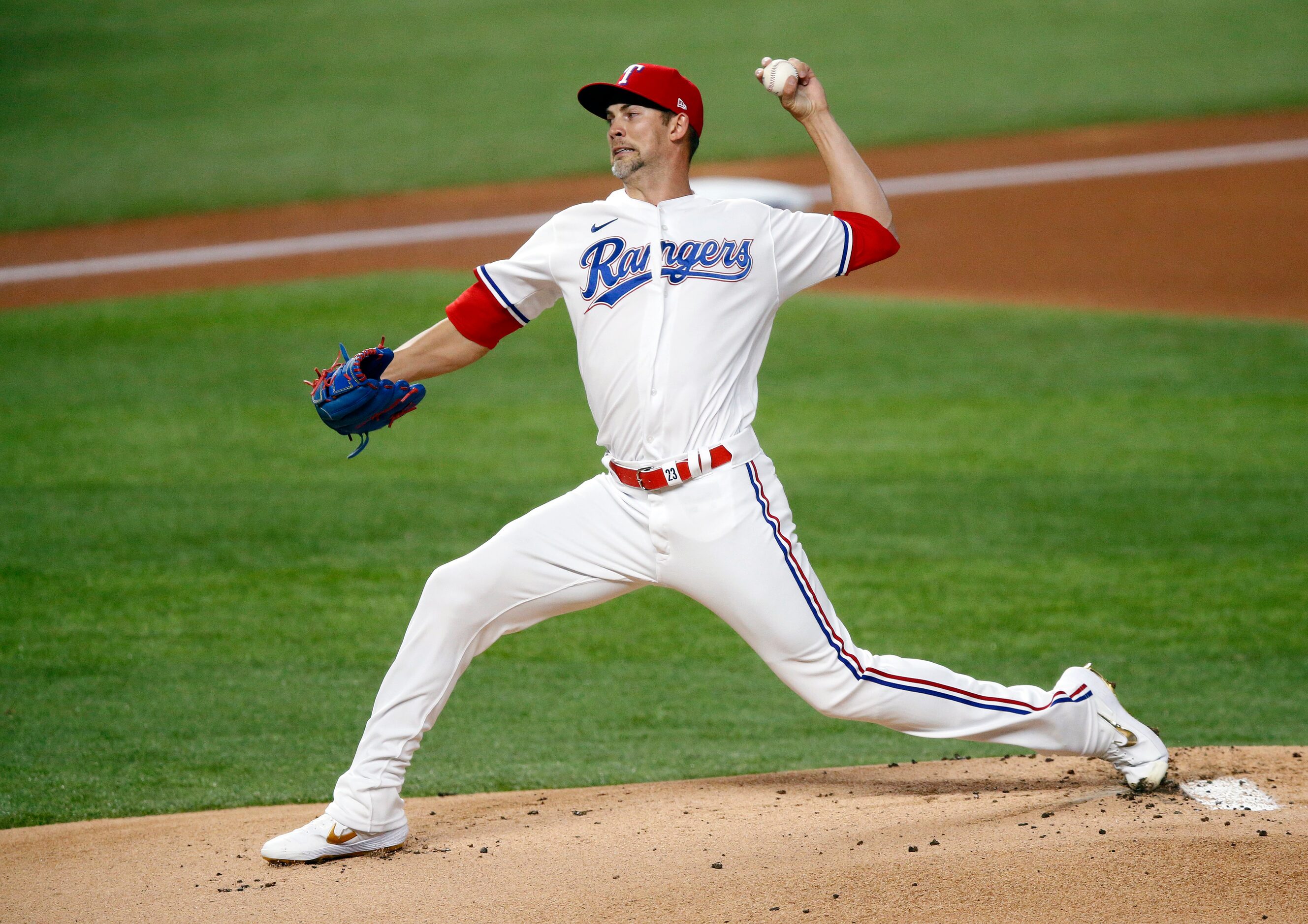 Texas Rangers starting pitcher Mike Minor (23) throws in the first inning against the...