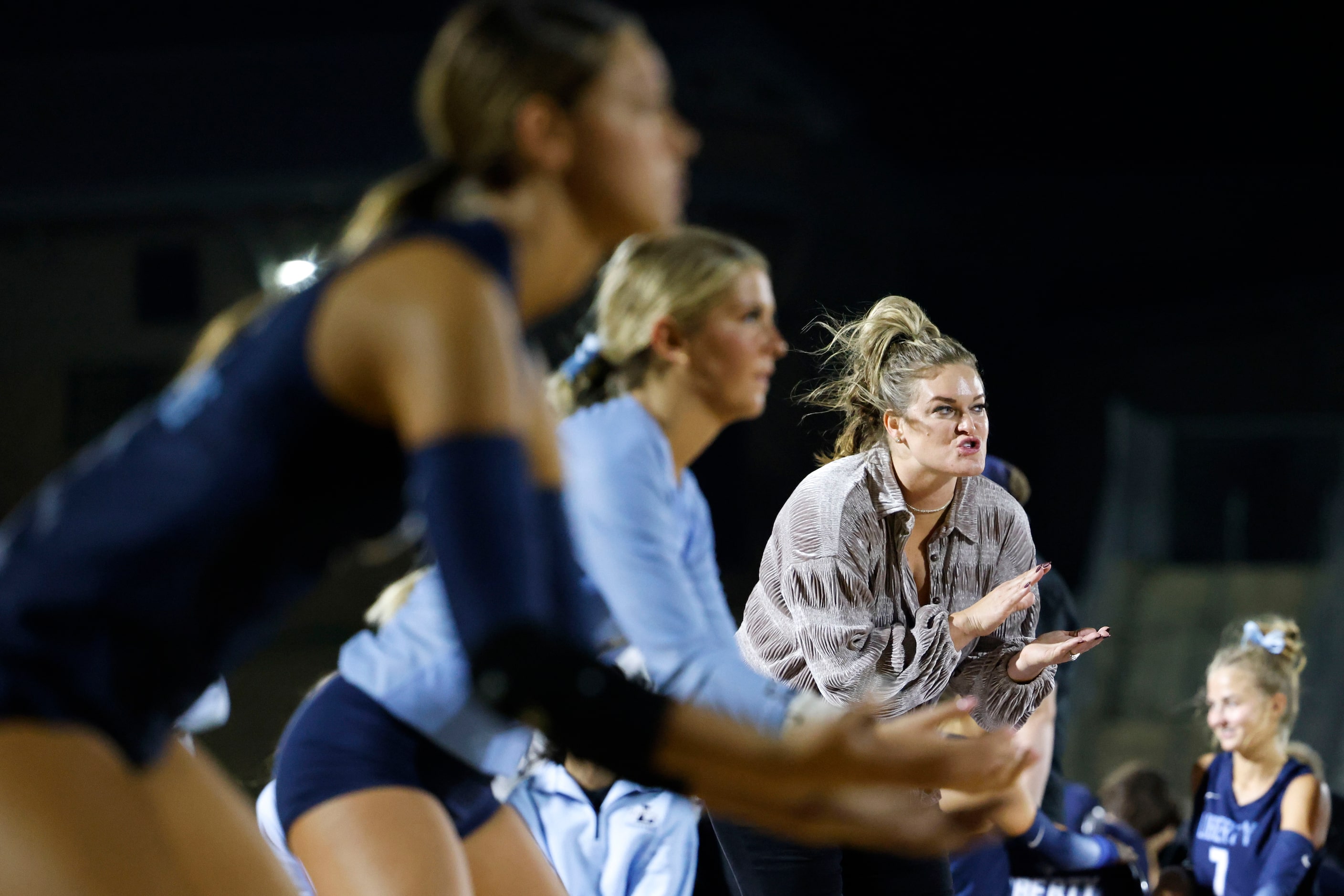 Liberty Christian School volleyball head coach Megan Degroot instructs during an outdoor...