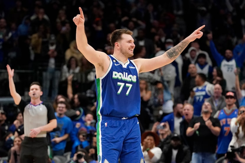 Dallas Mavericks guard Luka Doncic (77) celebrates scoring the game tying basket during the...