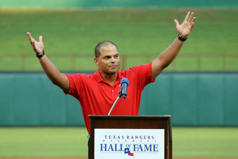 Former Texas catcher Ivan "Pudge" Rodriguez acknowledges the crowd a the end of his speech...