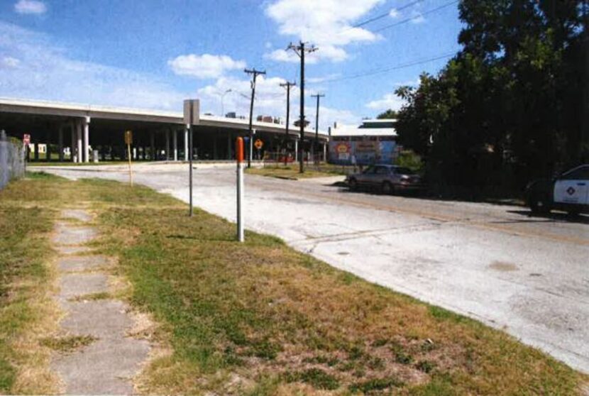 Natalie Simms was sitting along the curb on this street.