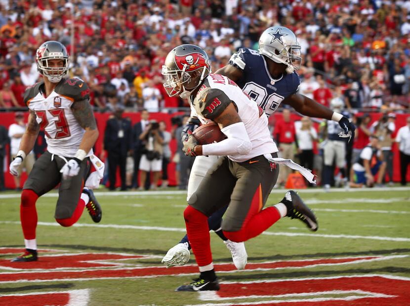 Tampa Bay Buccaneers free safety Bradley McDougald (30) catches an interception in end zone...