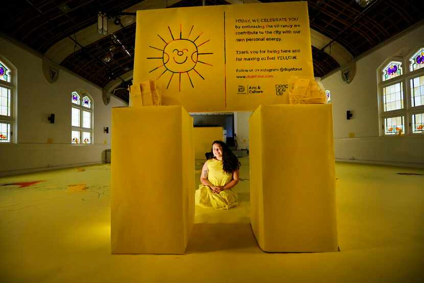 Artist Natalia Padilla, founder of Dsgn For Us, poses for a photo with her project,...
