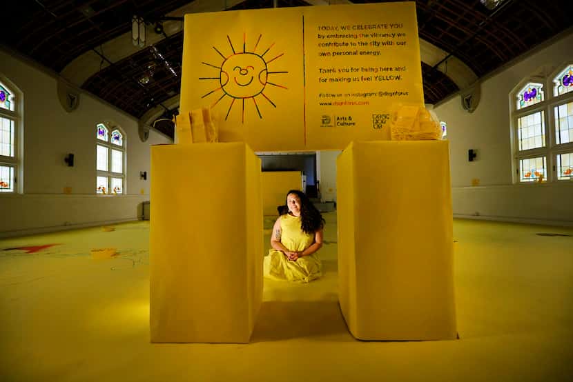 Artist Natalia Padilla, founder of Dsgn For Us, poses for a photo with her project,...