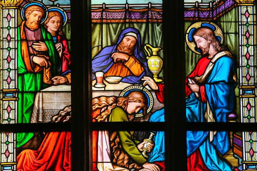 Stained Glass window in St. Vitus Cathedral, Prague, depicting Mary Magdalen anointing...
