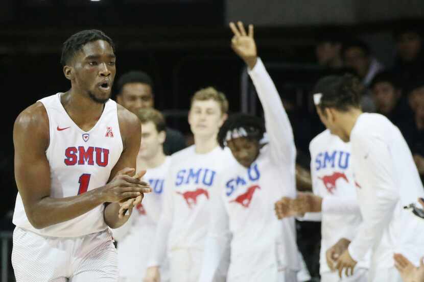 SMU guard Shake Milton (1) celebrates after making a 3-point basket in the first half of an...