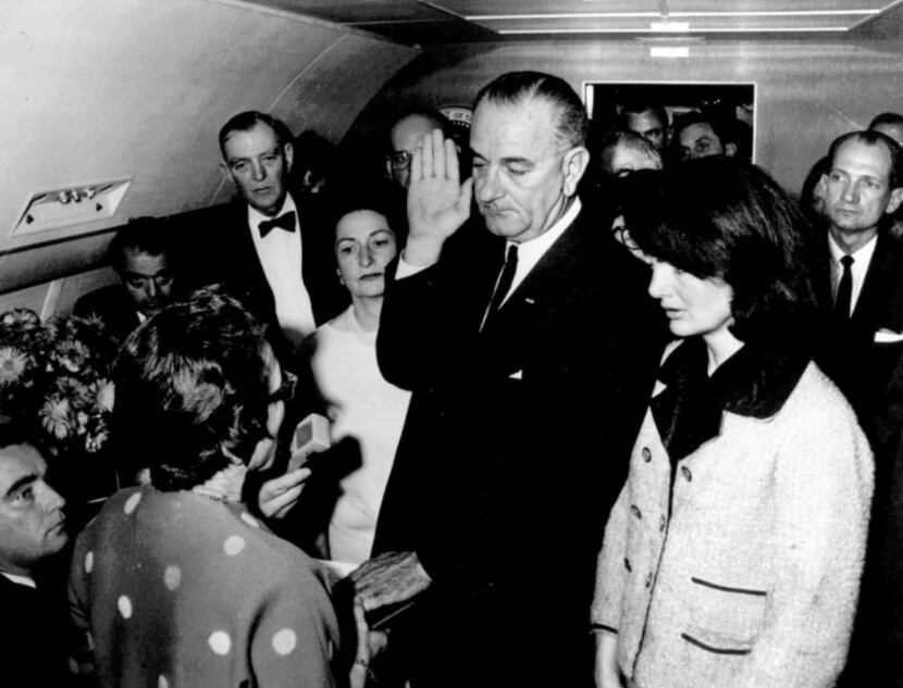 U.S. Rep. Jack Brooks (far right) looks on as as Vice President Lyndon B. Johnson takes the...