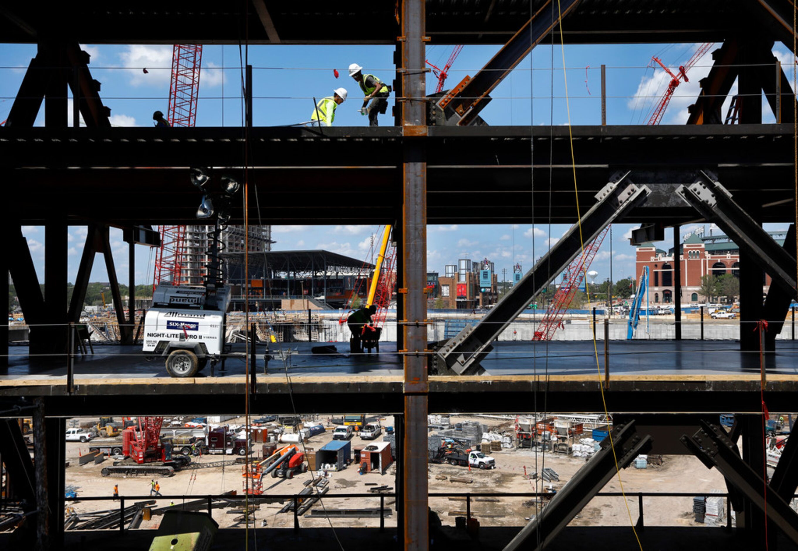 Work continues on the upper right field concourses at the new Globe Life Field under...