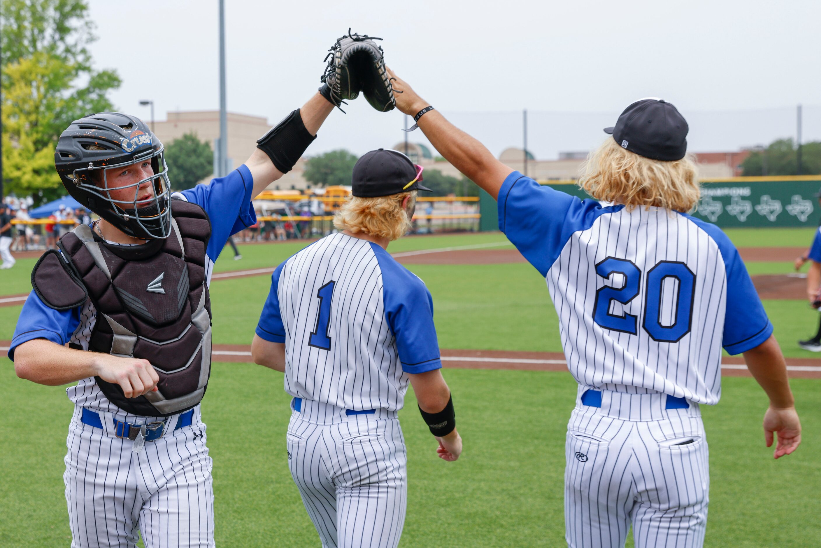 Byron Nelson High School’s catcher Carson Packan (left) and Alejandro Gomez (righ) high...