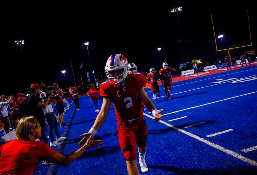 Parish Episcopal quarterback Preston Stone celebrates after a Panthers touchdown against...