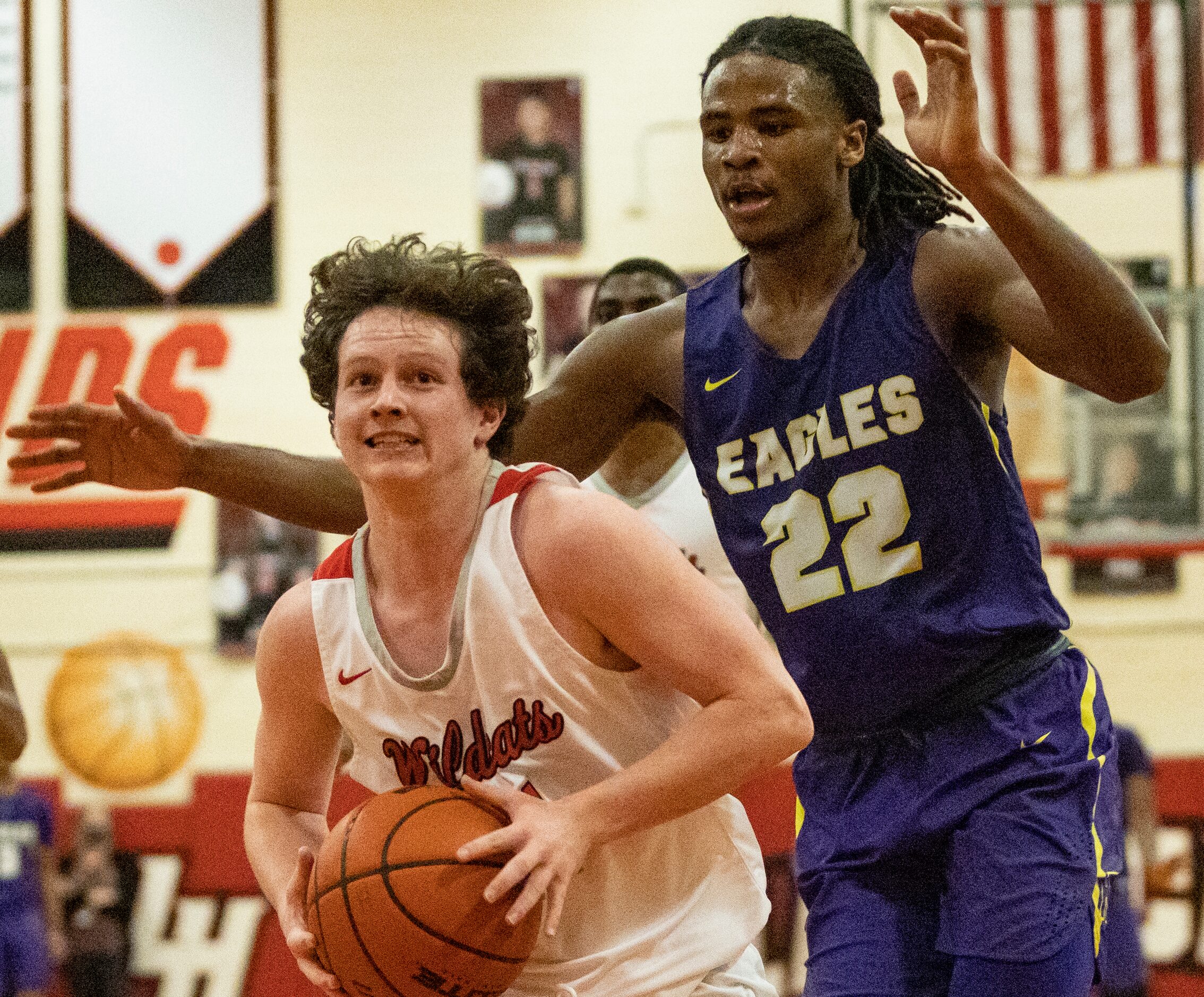 Lake Highlands High School Reid Hocker (11) looks up at the basket while running with the...