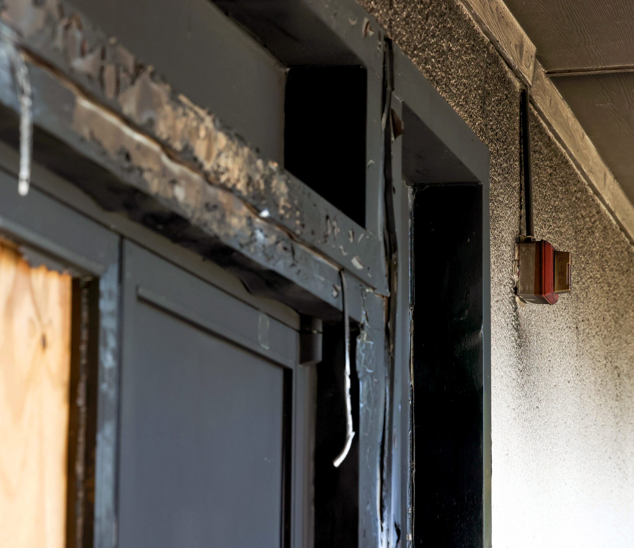 Damage to the doorway of Community Unitarian Universalist Church of Plano is visible on...