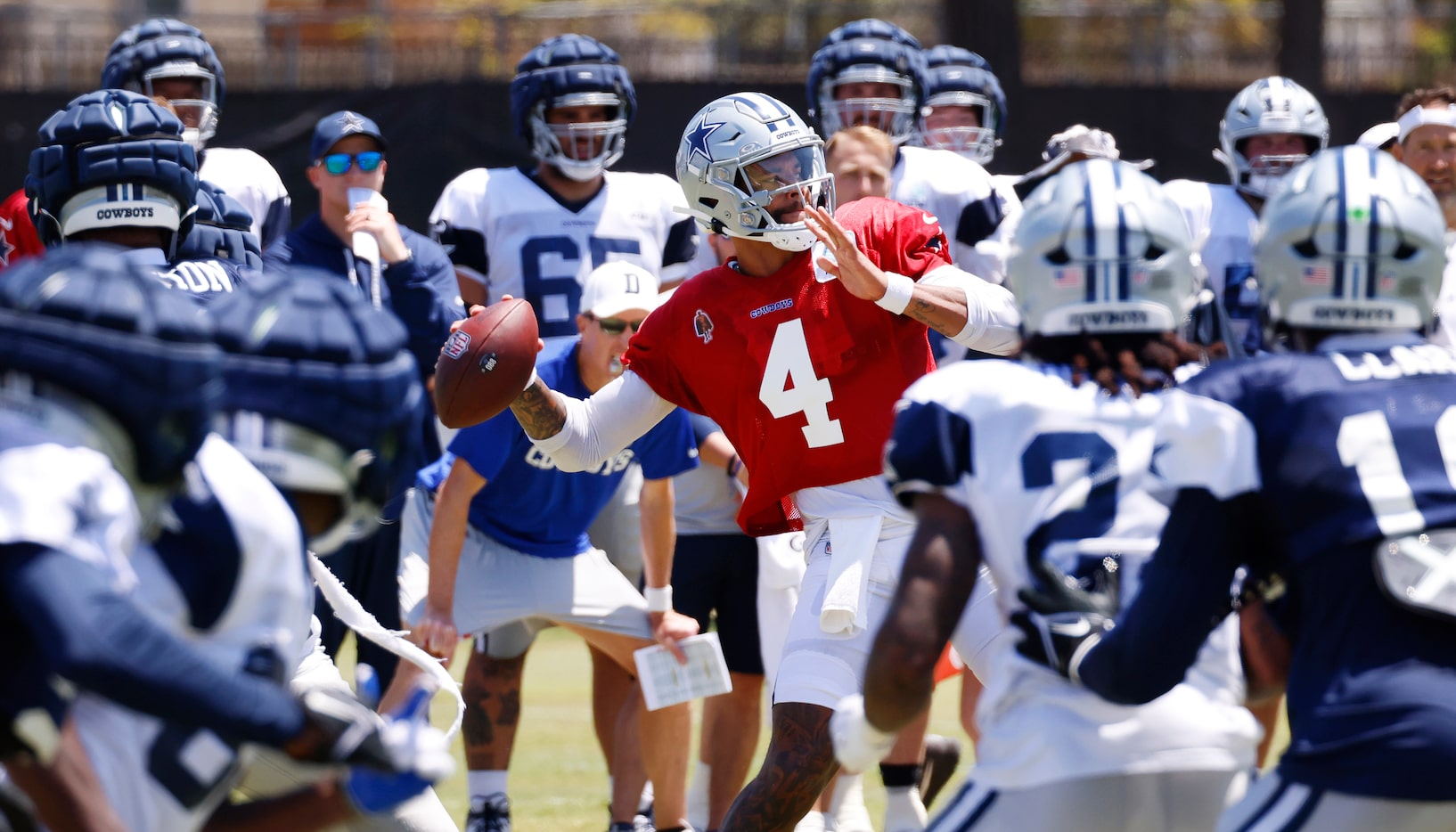 Dallas Cowboys quarterback Dak Prescott (4)  heaved a long pass to wide receiver KaVontae...