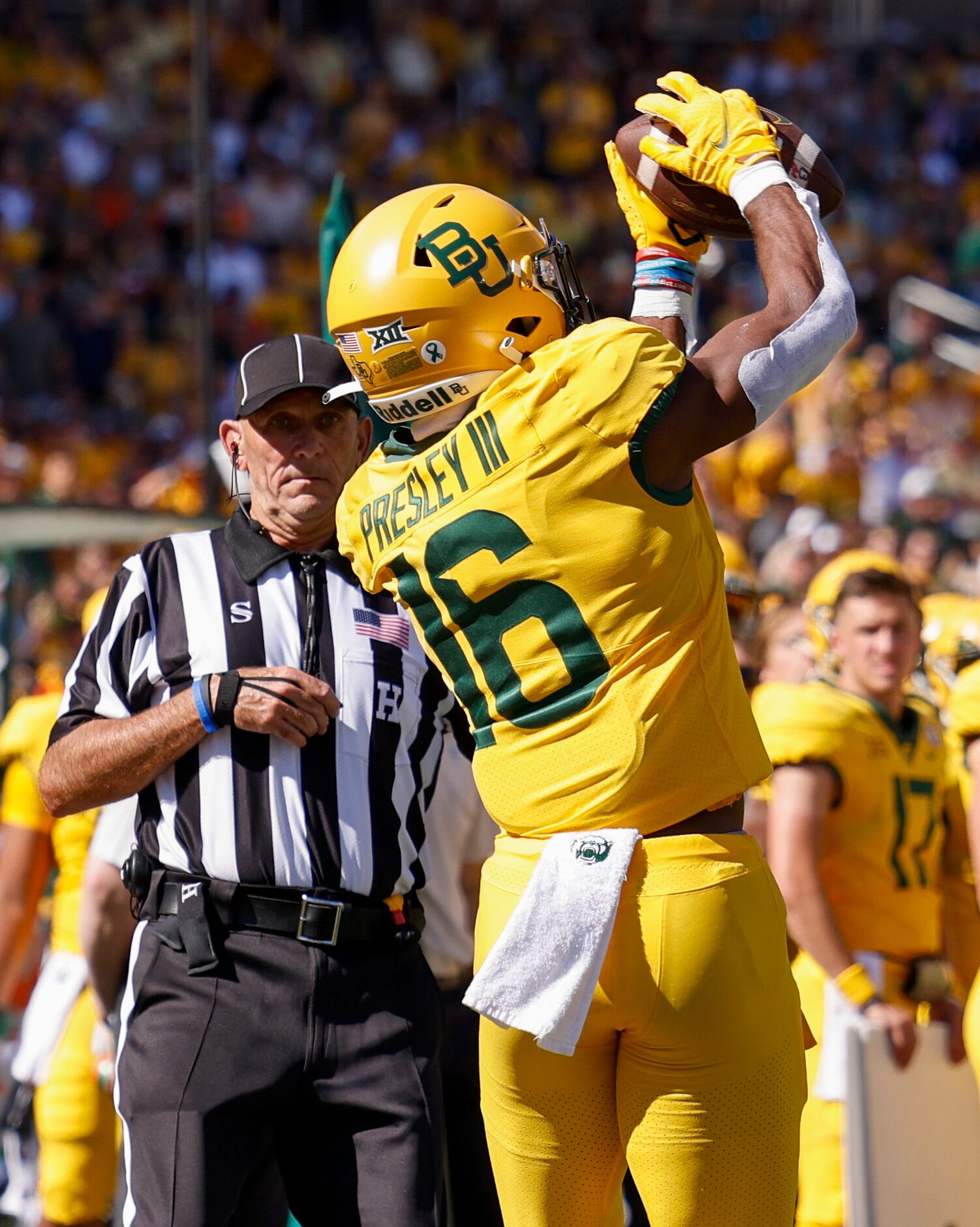 Baylor wide receiver Hal Presley (16) hauls in a catch along the sidelines during the second...