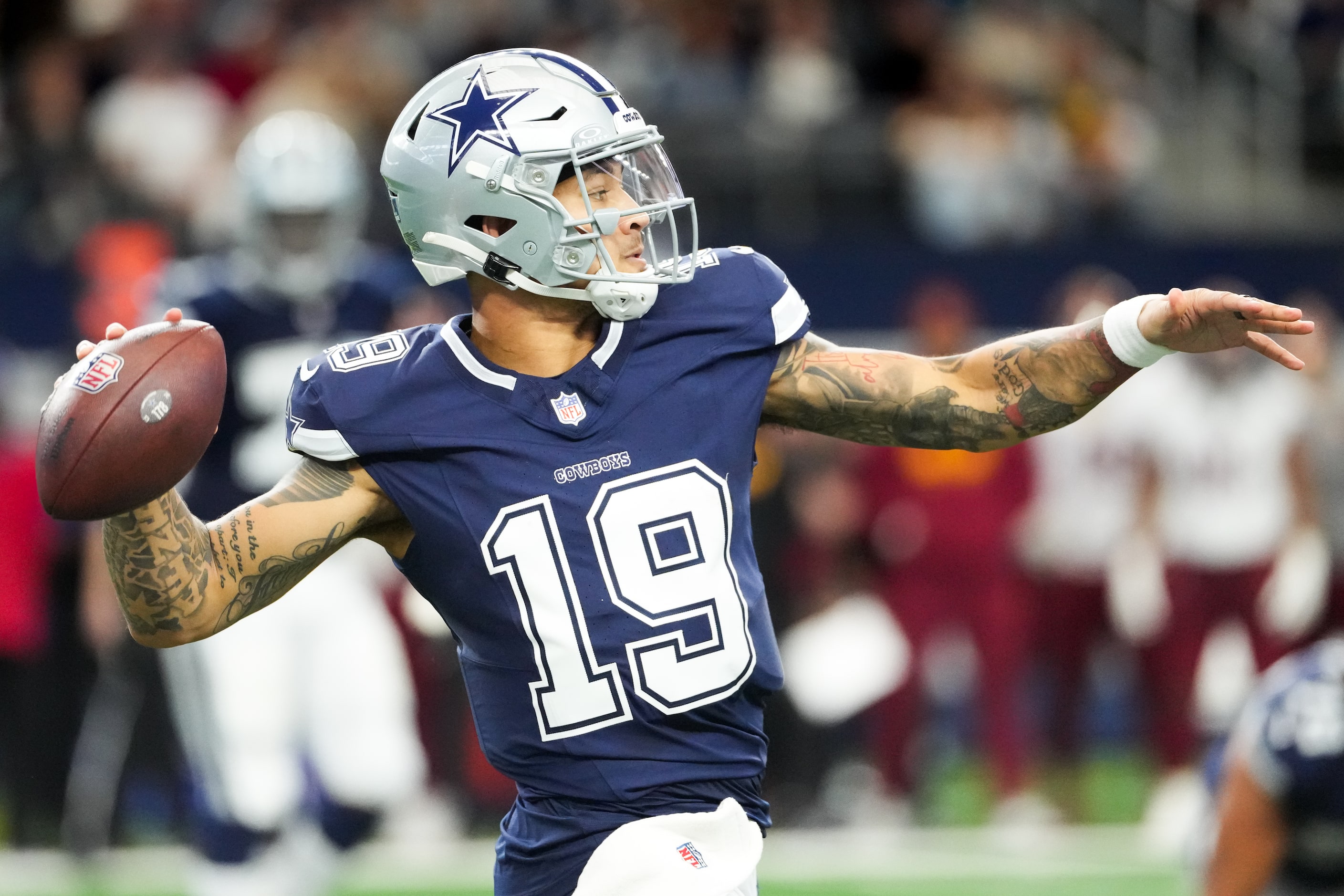 Dallas Cowboys quarterback Trey Lance (19) throws a pass during the first half of an NFL...