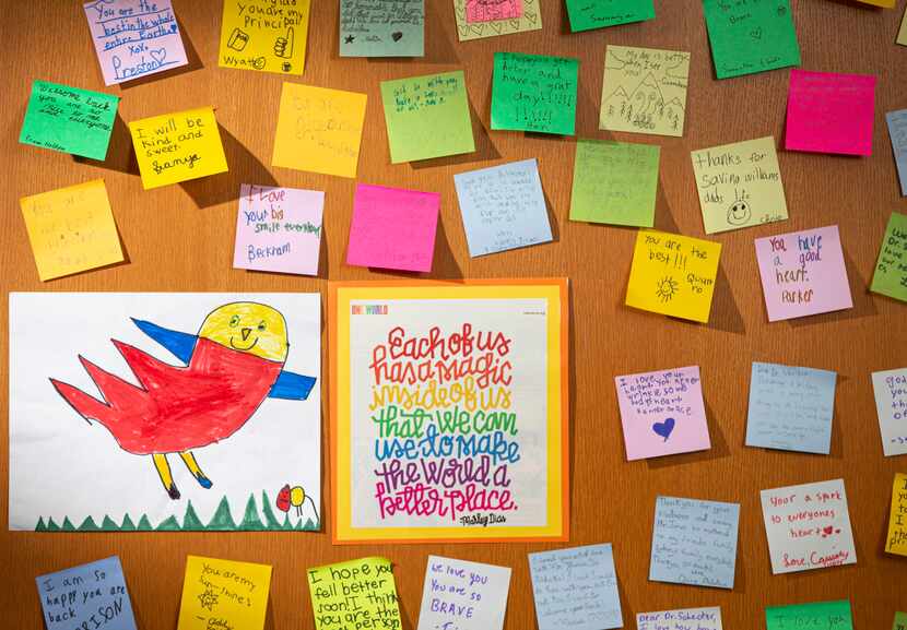 Students wrote 'get well soon' post-it notes and placed them on the office door of Sarah...