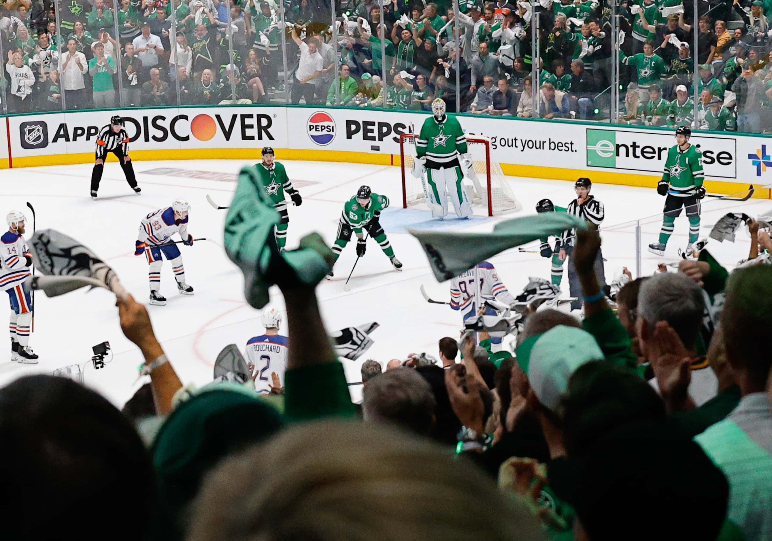 Fans cheer in the third period during Game 1 of the NHL hockey Stanley Cup Western...