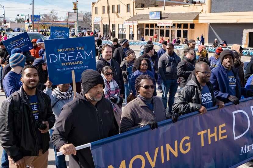USAA workers participate in a Dallas' MLK Parade.