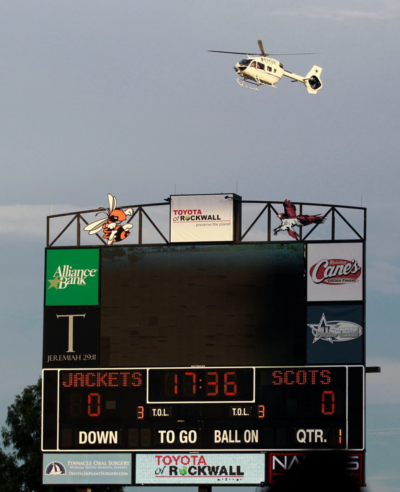 Dallas Cowboy's owner Jerry Jones brings his helicopter to Wilkerson-Sanders Stadium before...