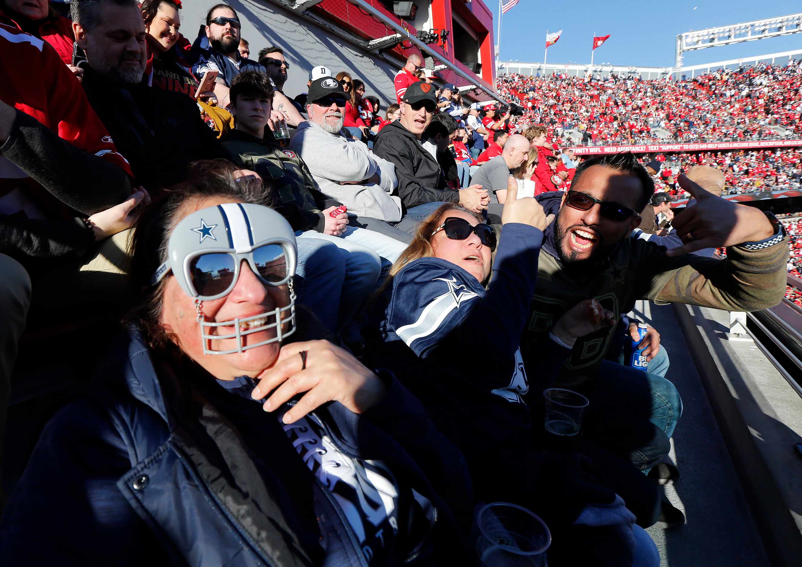 Dallas Cowboys fans cheer their team before the NFC Divisional game against the San...