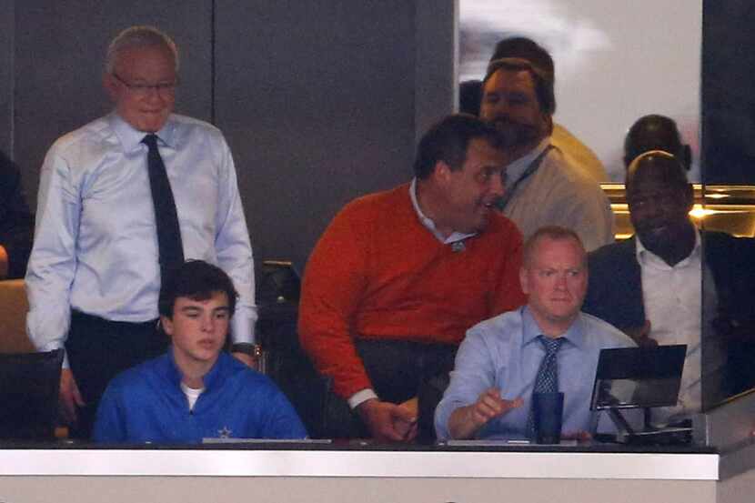 New Jersey governor Chris Christie (in orange sweater) visits with Cowboys Hall of Fame...