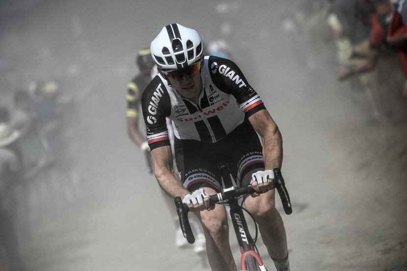 Chad Haga rides through a cobblestone section during the ninth stage of the 105th edition of...