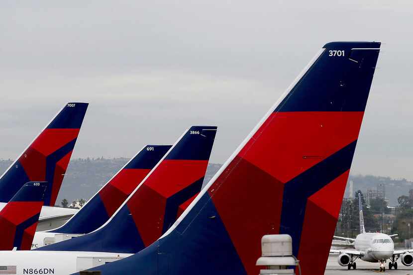 Delta Airlines aircraft are lined up at Terminal 5 in Los Angeles International Airport on...