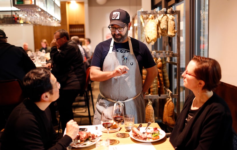 Chef David Uygur talks to diners at Macellaio in Oak Cliff.